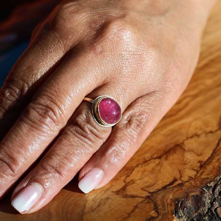 Smooth Domed Pink Tourmaline Cabochon Gold Ring lifestyle image | Breathe Autumn Rain Jewelry