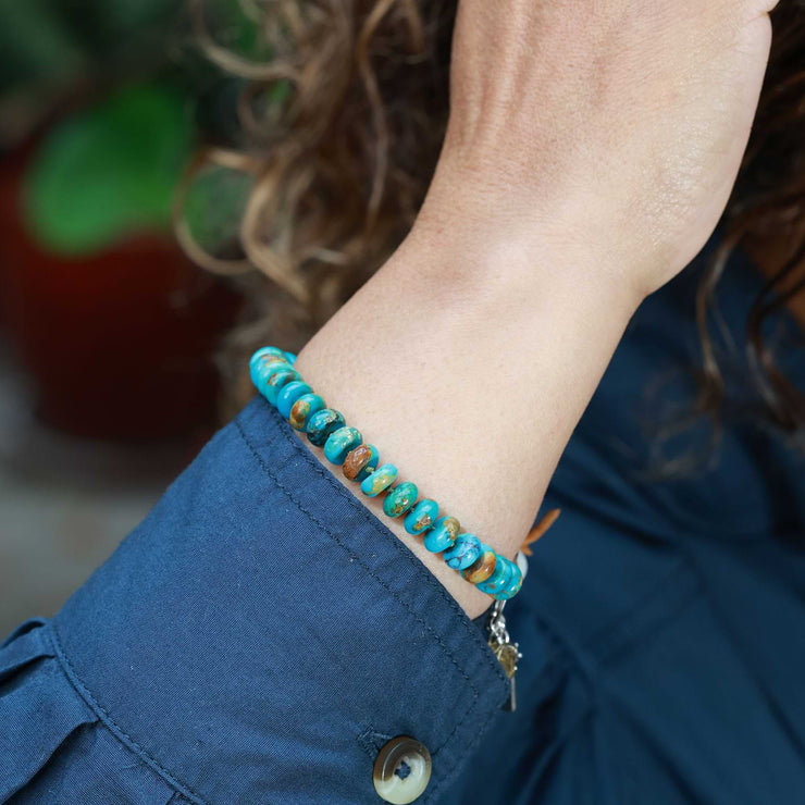 Apache - Rustic Turquoise and Sterling Silver Bracelet lifestyle image 2 | Breathe Autumn Rain Artisan Jewelry