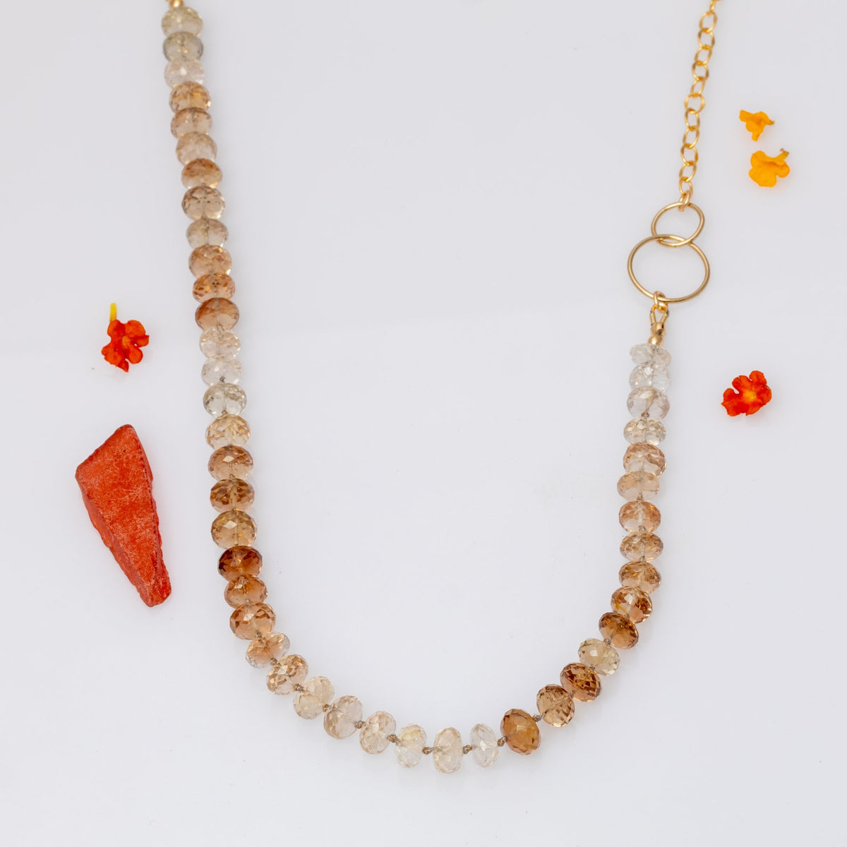 Stay Neutral faceted champagne topaz gold necklace laid flat showing champagne to honey gradient – Breathe Autumn Rain