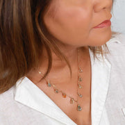 Drip Drop - Faceted Aquamarine and Beryl Gold Necklace life style image | Breathe Autumn Rain