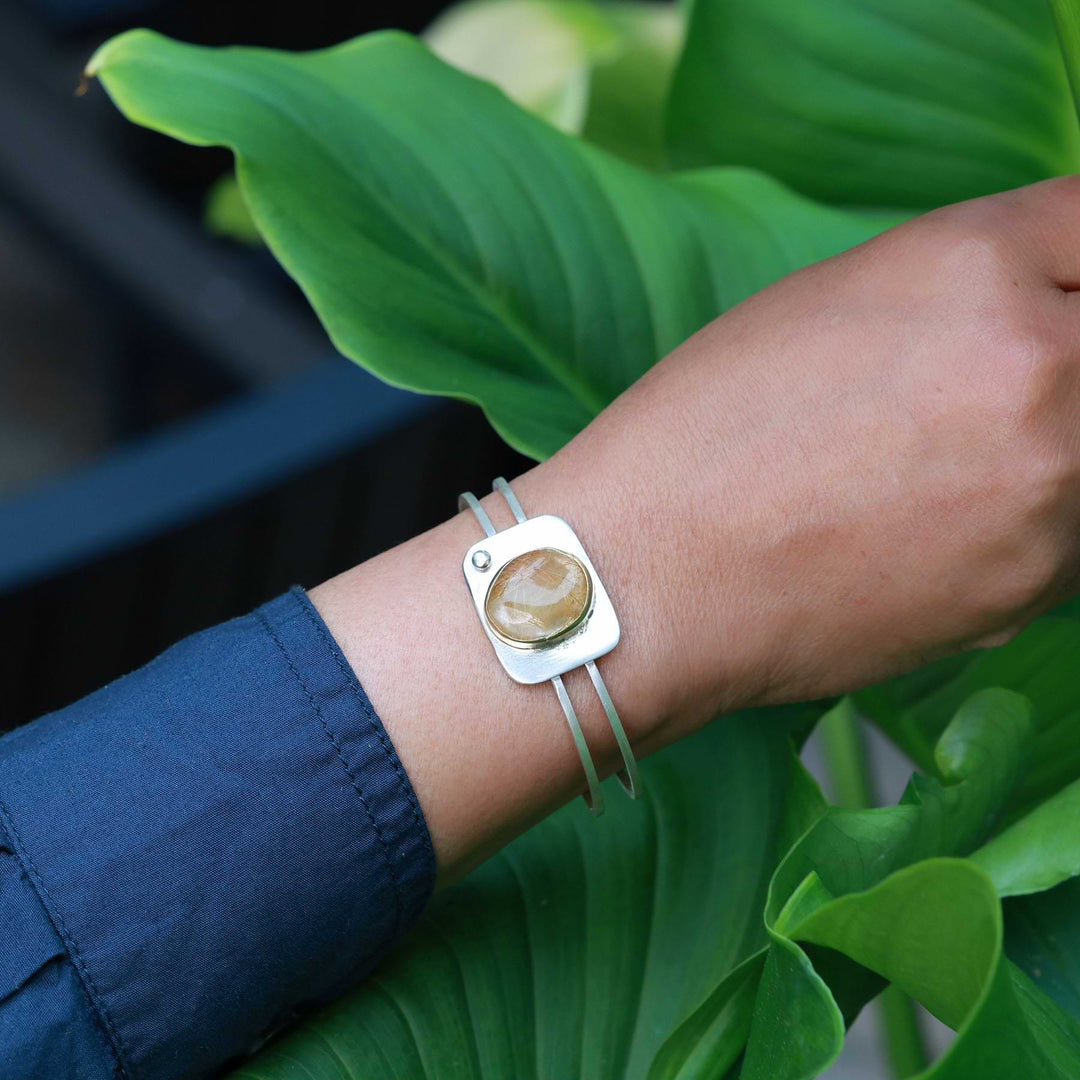 Golden - Rutilated Quartz Mixed Metal Cuff Bracelet lifestyle main image | Breathe Autumn Rain Artisan Jewelry