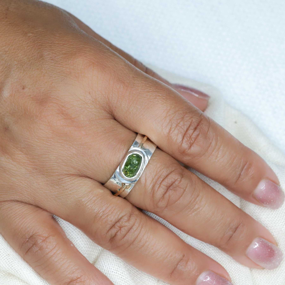 Raincloud - Green Tourmaline Silver and Gold Wide Band Ring lifestyle image | Breathe Autumn Rain Jewelry