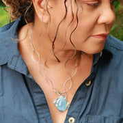Theia - Aquamarine Pendant Silver Necklace lifestyle image | Breathe Autumn Rain Artisan Jewelry