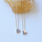 Gliding Heart - Silver Heart Necklace main image | Breathe Autumn Rain Artisan Jewelry