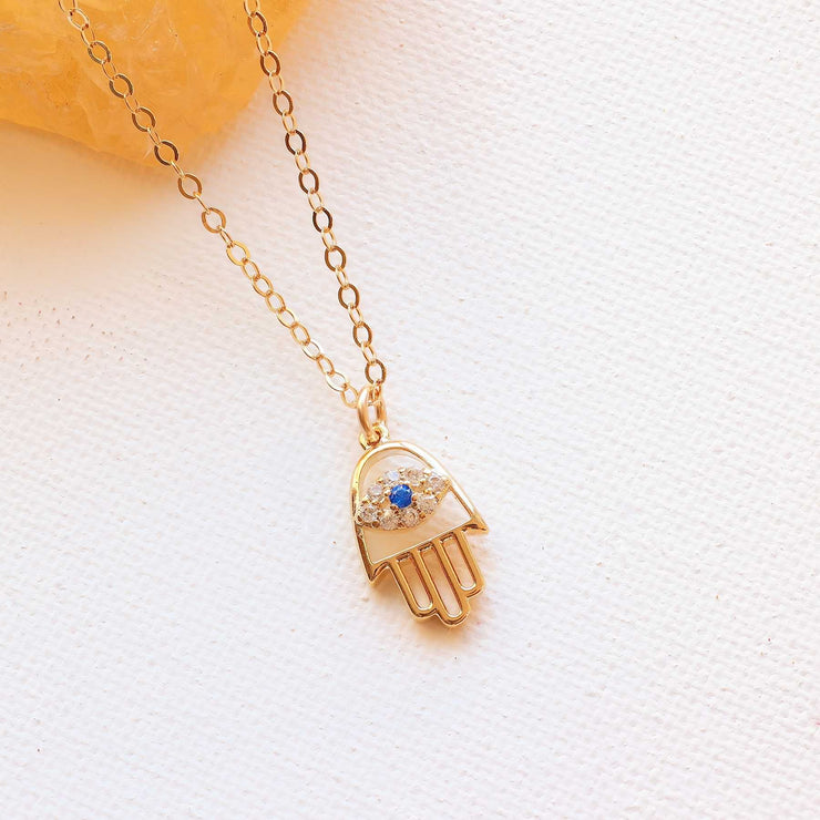 Kioni - Gold Evil Eye Hamsa Necklace main image | Breathe Autumn Rain Artisan Jewelry