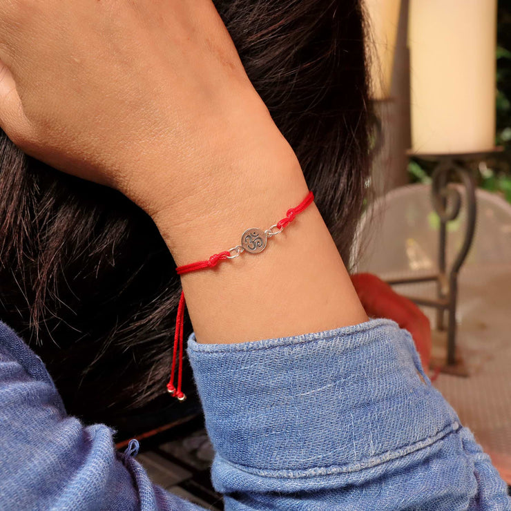 Sterling Silver Om Cord Bracelet life style image | Breathe Autumn Rain Artisan Jewelry
