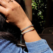 We Live for Love - Silver Charm Cord Bracelet life style image | Breathe Autumn Rain Artisan Jewelry
