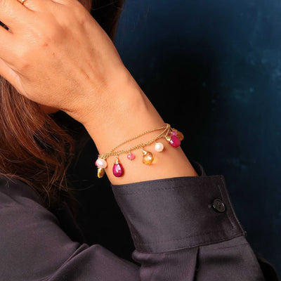 Winter Wonderland - Ruby, Citrine, Pearls and Pink Sapphire Gold Charm Bracelet life style image | Breathe Autumn Rain Artisan Jewelry